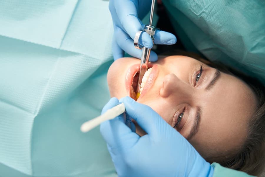 woman-sedated-during-a-dental-treatment